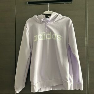Lilac adidas hoodie. Pockets are hidden.